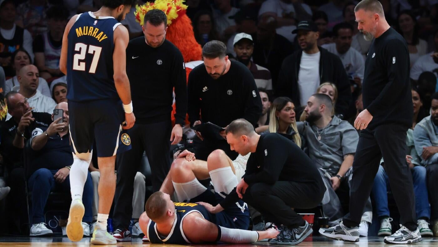 Denver Nuggets Star Nikola Jokić Exits Heat Game with Concerning Left Knee Injury