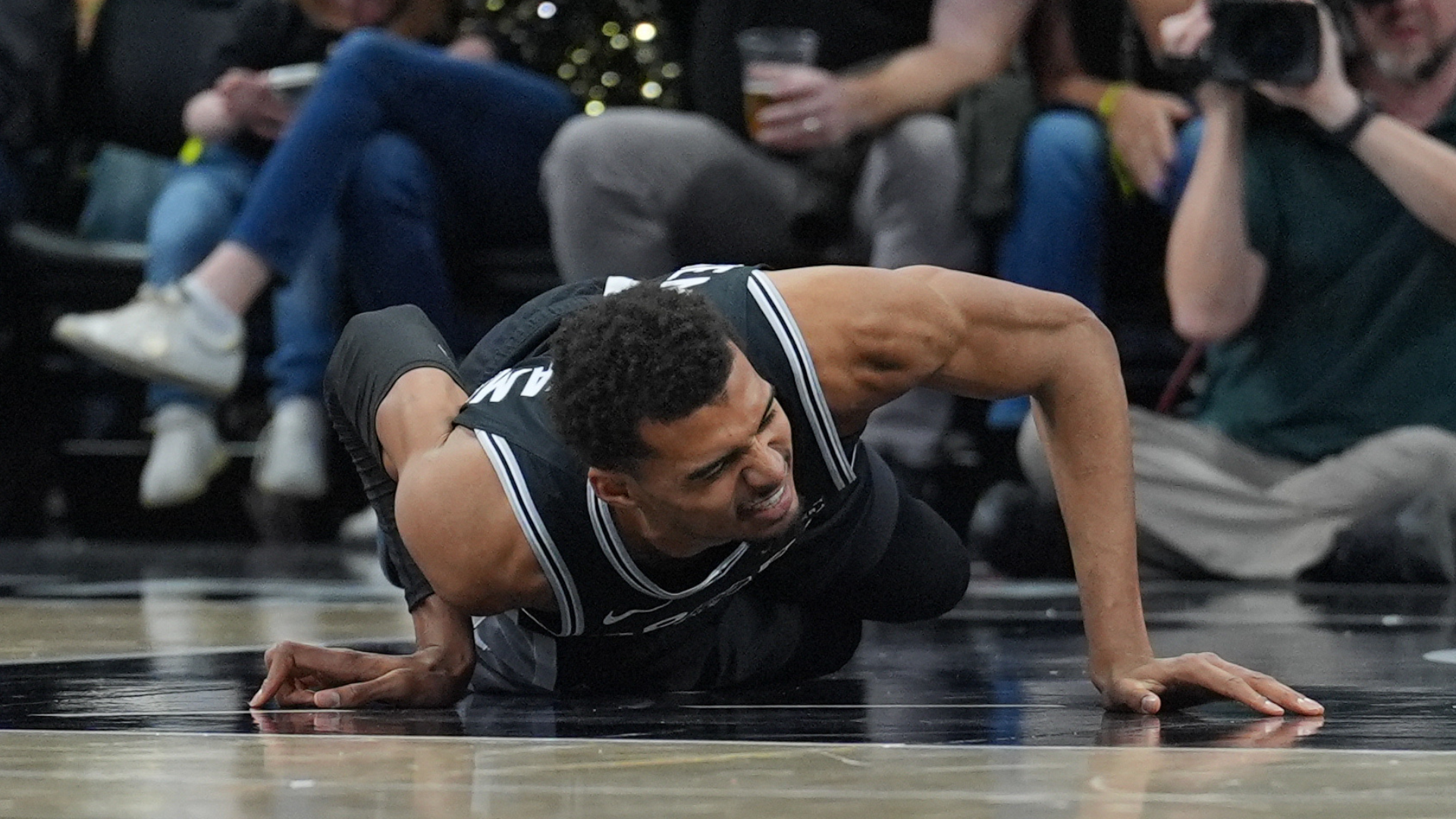 San Antonio Spurs’ Cornerstone Victor Wembanyama Sustains Hyperextended Knee, Early Tests Indicate No Major Structural Damage.