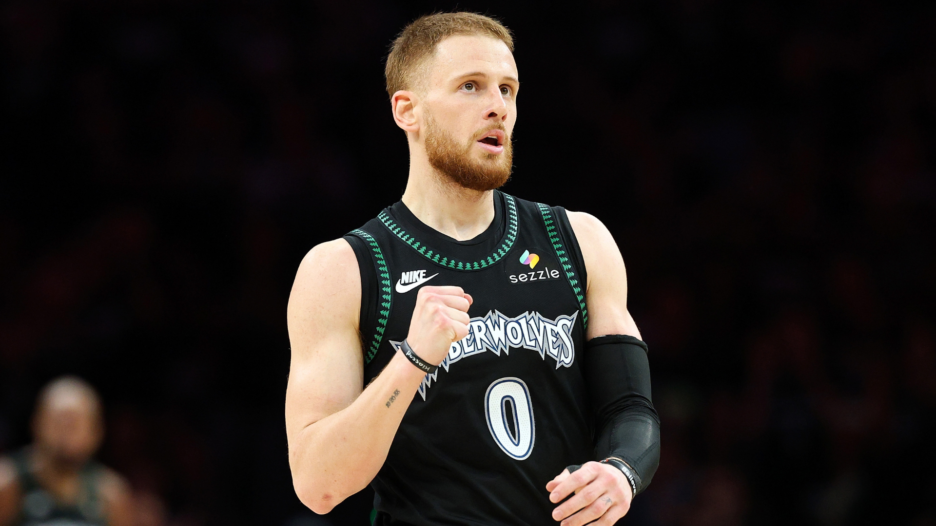 Minnesota Timberwolves Guard Donte DiVincenzo Sidelined for Season with Torn Achilles Tendon, Casting Shadow on Playoff Run
