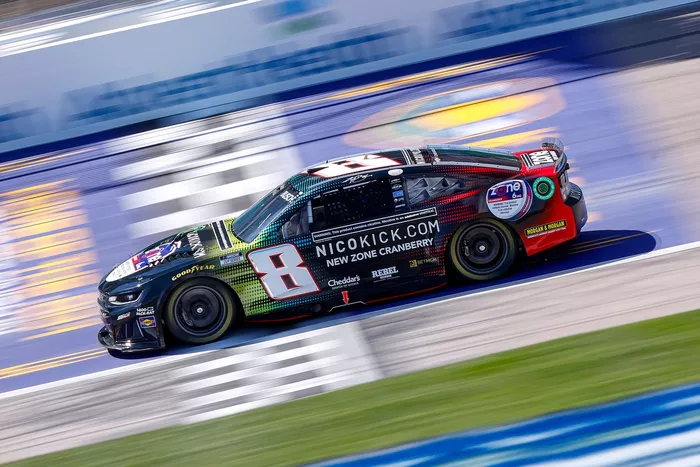 Denny Hamlin Offers Measured Defense and Admiration for Kyle Busch Amidst Podcast Controversy