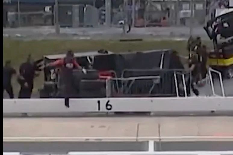 Heroic Pit Crew Member Suffers Injuries Shielding Reporter from Runaway Pit Cart at Dover