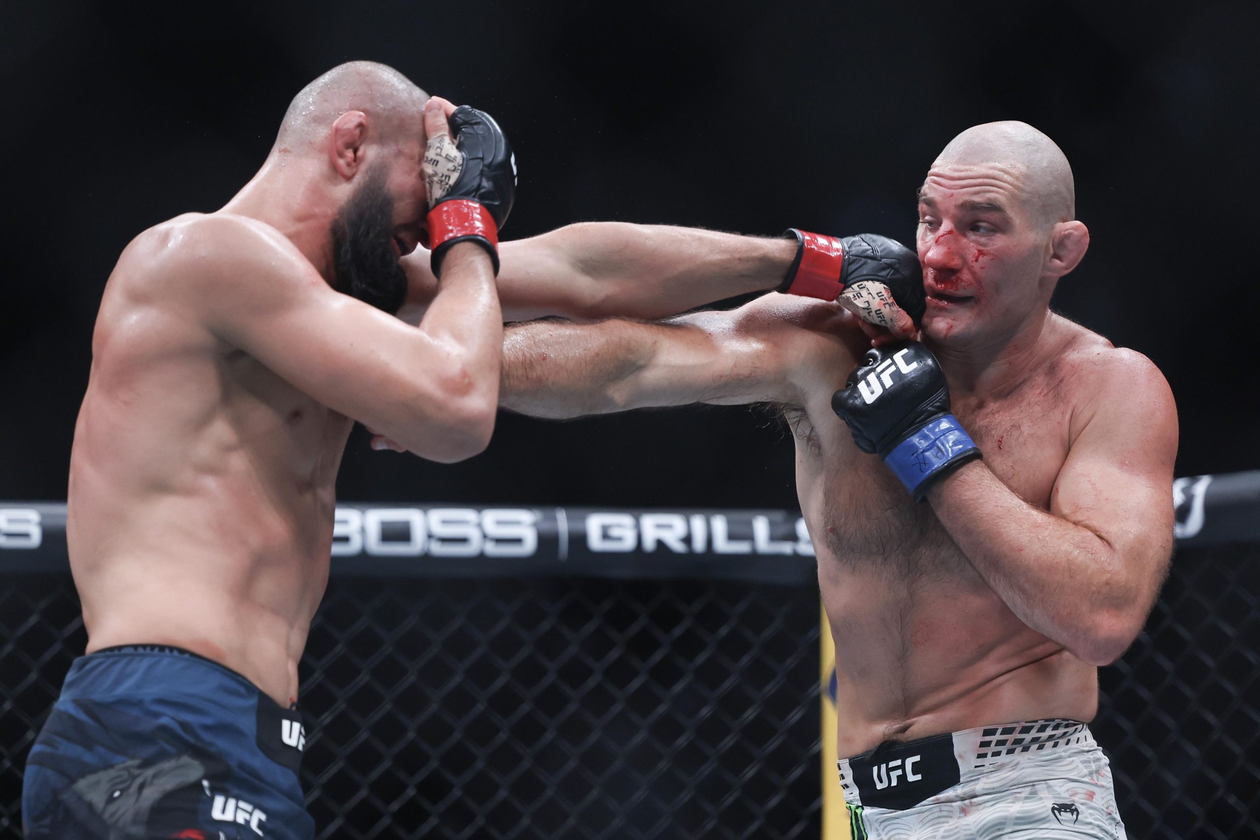 Sean Strickland Reclaims Middleweight Title in Tense UFC 328 Bout Against Khamzat Chimaev.