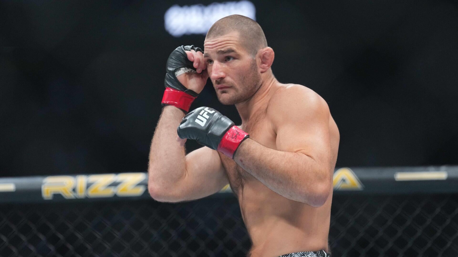 UFC 328: Chimaev vs. Strickland Middleweight Title Bout Headlines Newark Card with High Stakes and Expert Predictions.