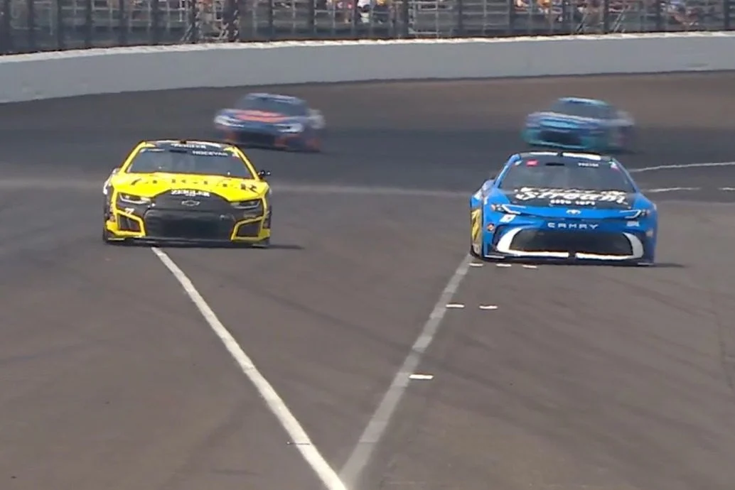 Hocevar’s Middle Finger Gesture to Heim Ignites Brickyard 400 Sparks, Culminating in Victory for Heim